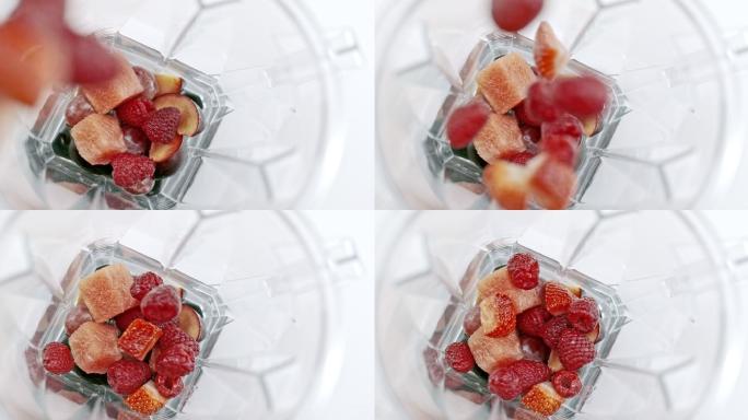 SLO MO向搅拌机罐中添加水果