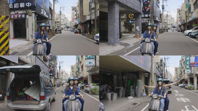 两名亚洲年轻女子在台湾街头骑摩托车