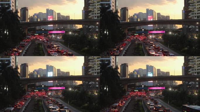 日落时分雅加达市中心繁忙的城市景象，交通繁忙