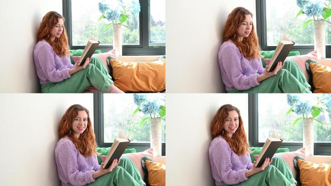 放松的白人女性在家看书的非正式肖像