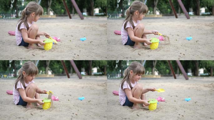 在沙坑里玩耍的女孩