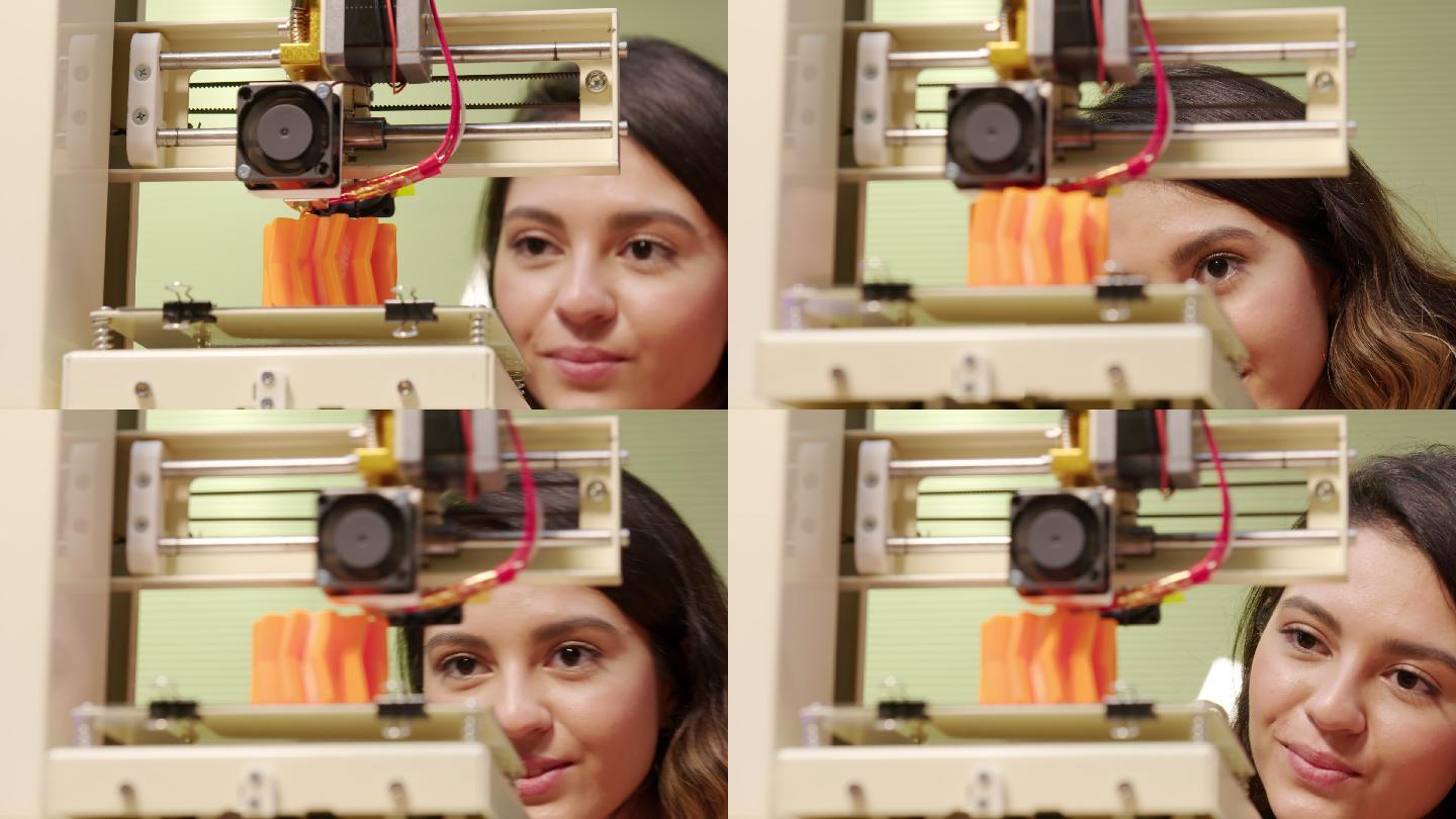看3D打印机的年轻女子