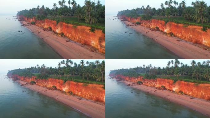 无人机拍摄的赤壁日出场景，泰国prachuapkhirikhan省泰国湾因风浪侵蚀形成的赤壁