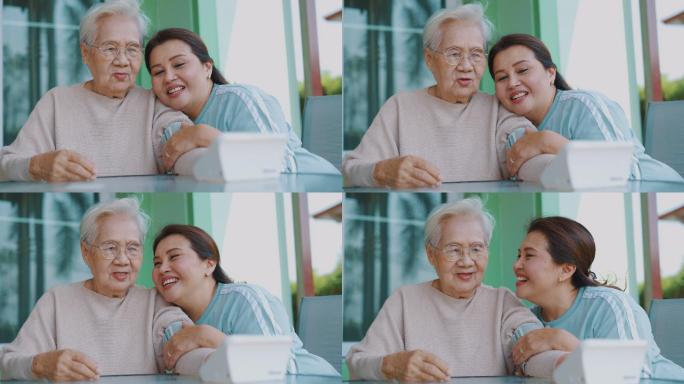 女性在家检查一位老年患者的血压