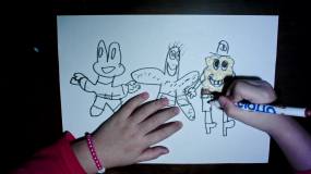 儿童绘制动画卡通人物timelaps视频素材