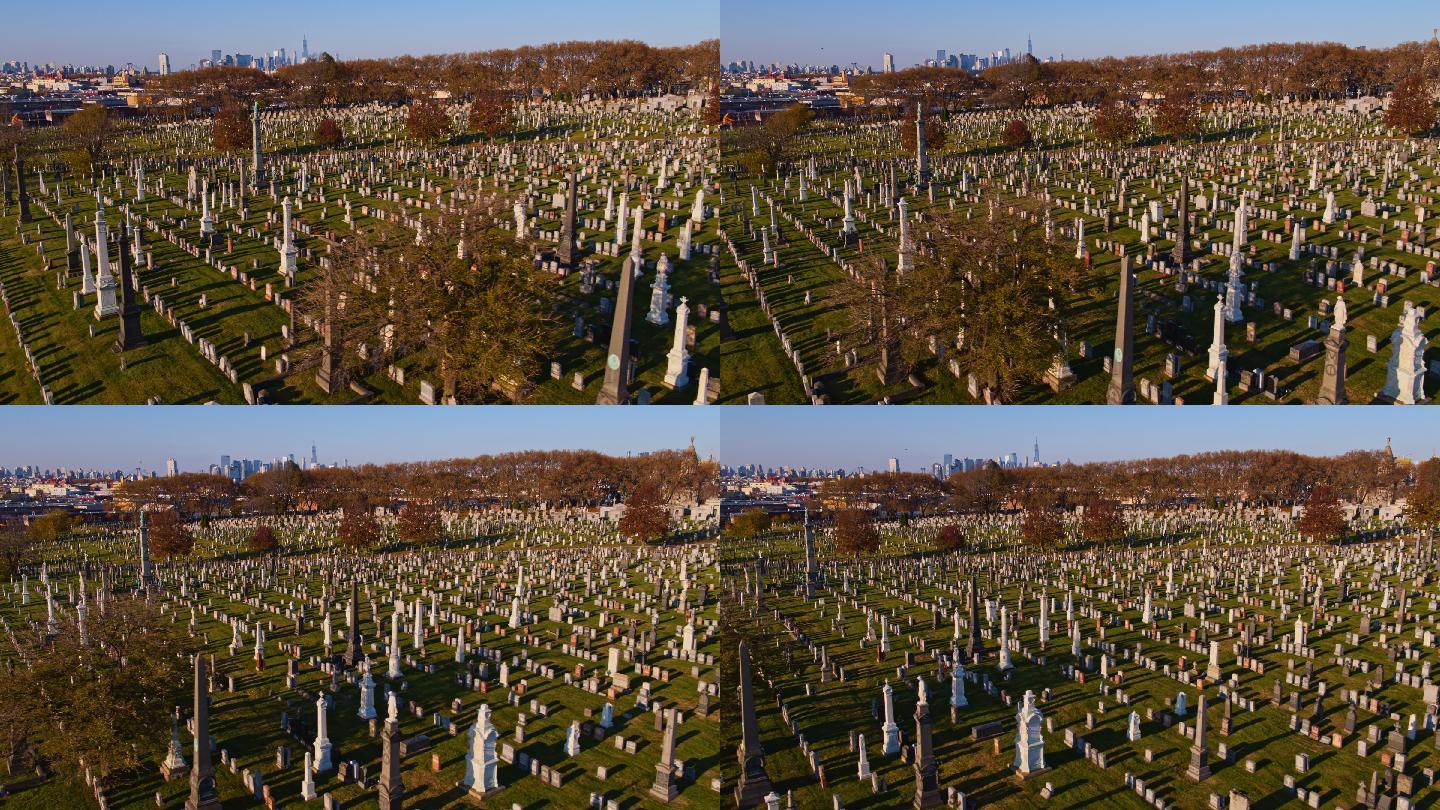 皇后区加尔瓦里公墓鸟瞰全景，背景是遥远的曼哈顿。无人机通过摇摄相机的动作制作视频。