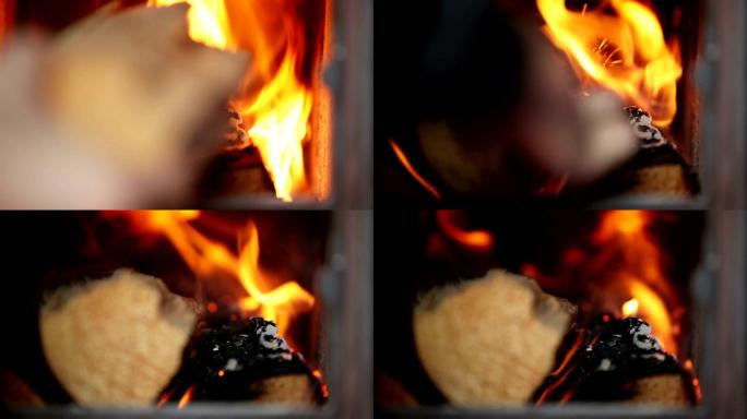 加热烤箱的人大火柴火烧火