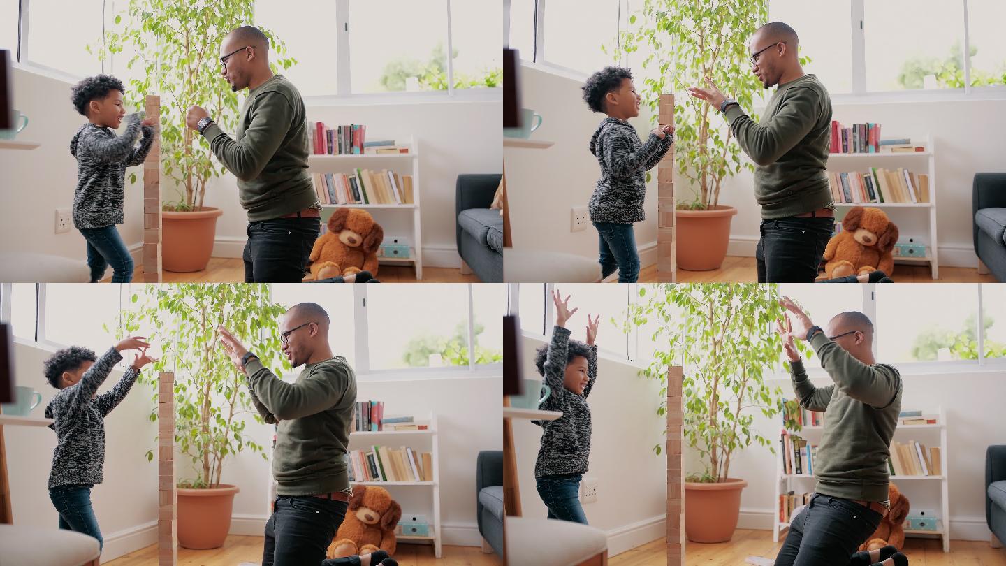 一个可爱的小男孩和他的父亲在家玩木块的4k视频片段
