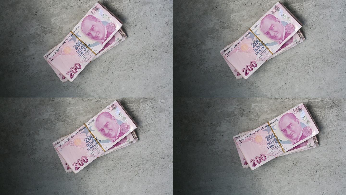 混凝土地板上堆满土耳其货币200土耳其里拉