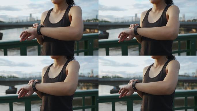 亚洲运动女性使用智能手表