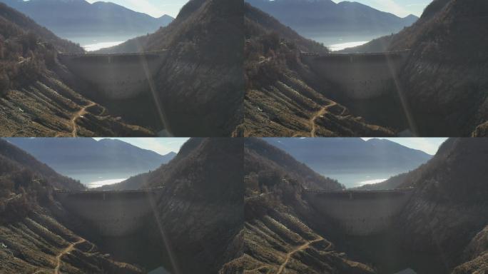 无人驾驶飞机拍摄了山中一座大坝，大坝后面的水位很低