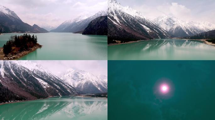 西藏林芝湖泊水天一色雪山