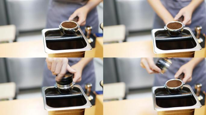 用捣固机将磨碎的咖啡压入便携式过滤器
