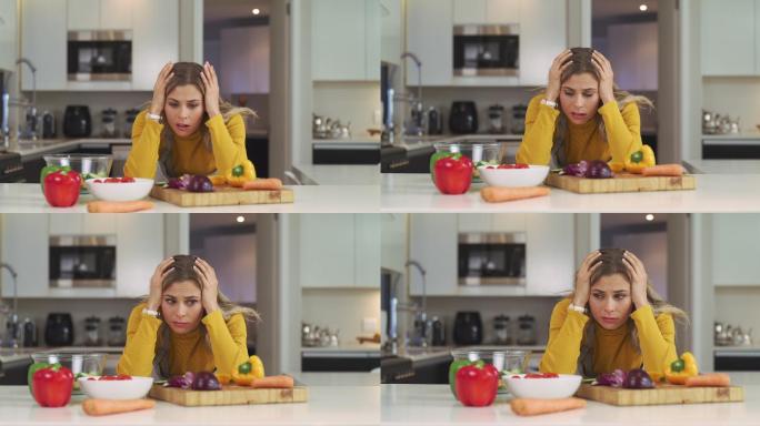 一名年轻女子在家做饭时看起来不知所措的4k视频片段