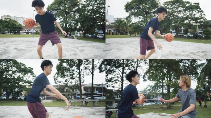 中国亚裔少年在周末上午的篮球练习赛中挑战一对一决斗和投篮