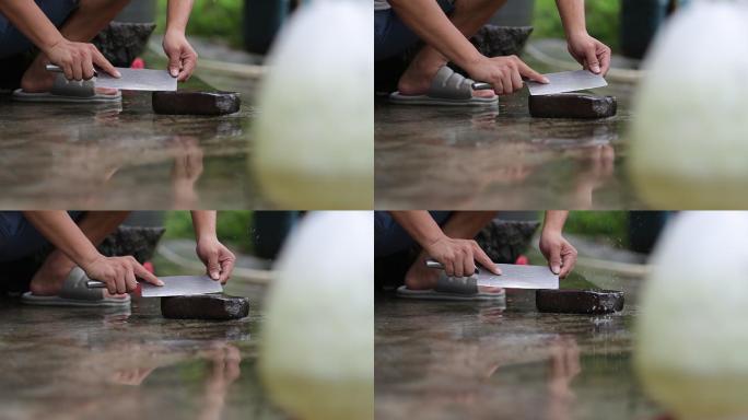 下雨天乡村做饭磨菜刀素材