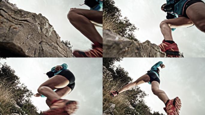阴天里，斯洛·莫（SLO-MO）女跑步者在跑道上跳到岩石上