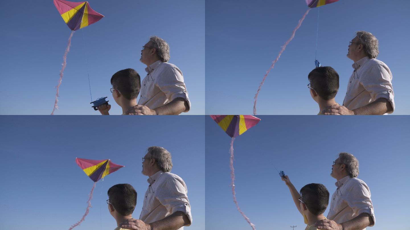 父亲和儿子正在放风筝