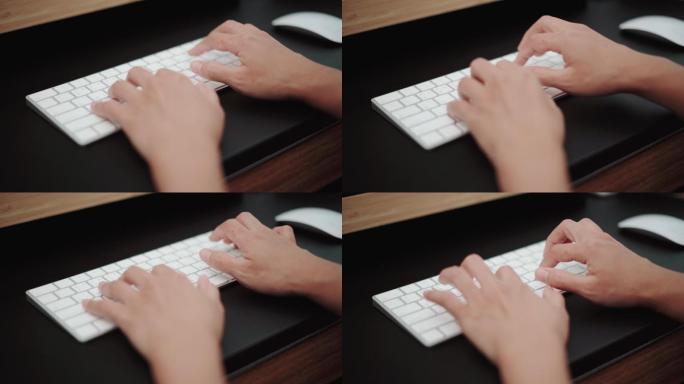亚洲女性在电脑键盘上打字