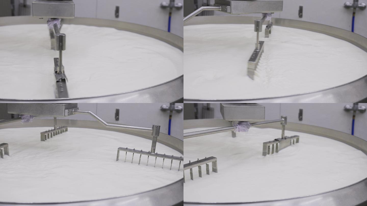 机械手臂在乳品厂搅拌牛奶