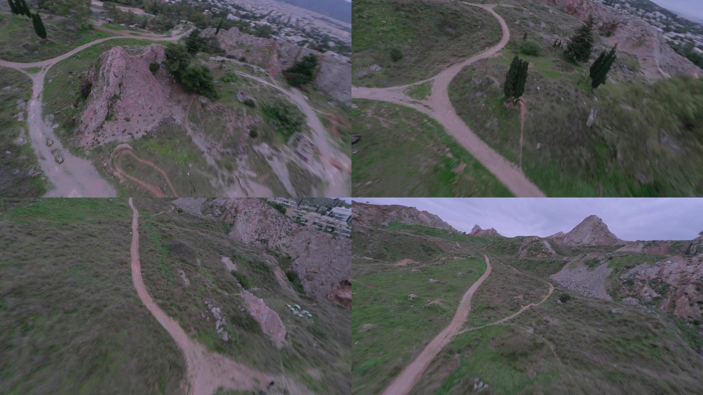 雅典北部普赛奇科（Psychiko）废弃采石场4K的快速航空FPV镜头，乌云密布-普赛奇科（Psyc