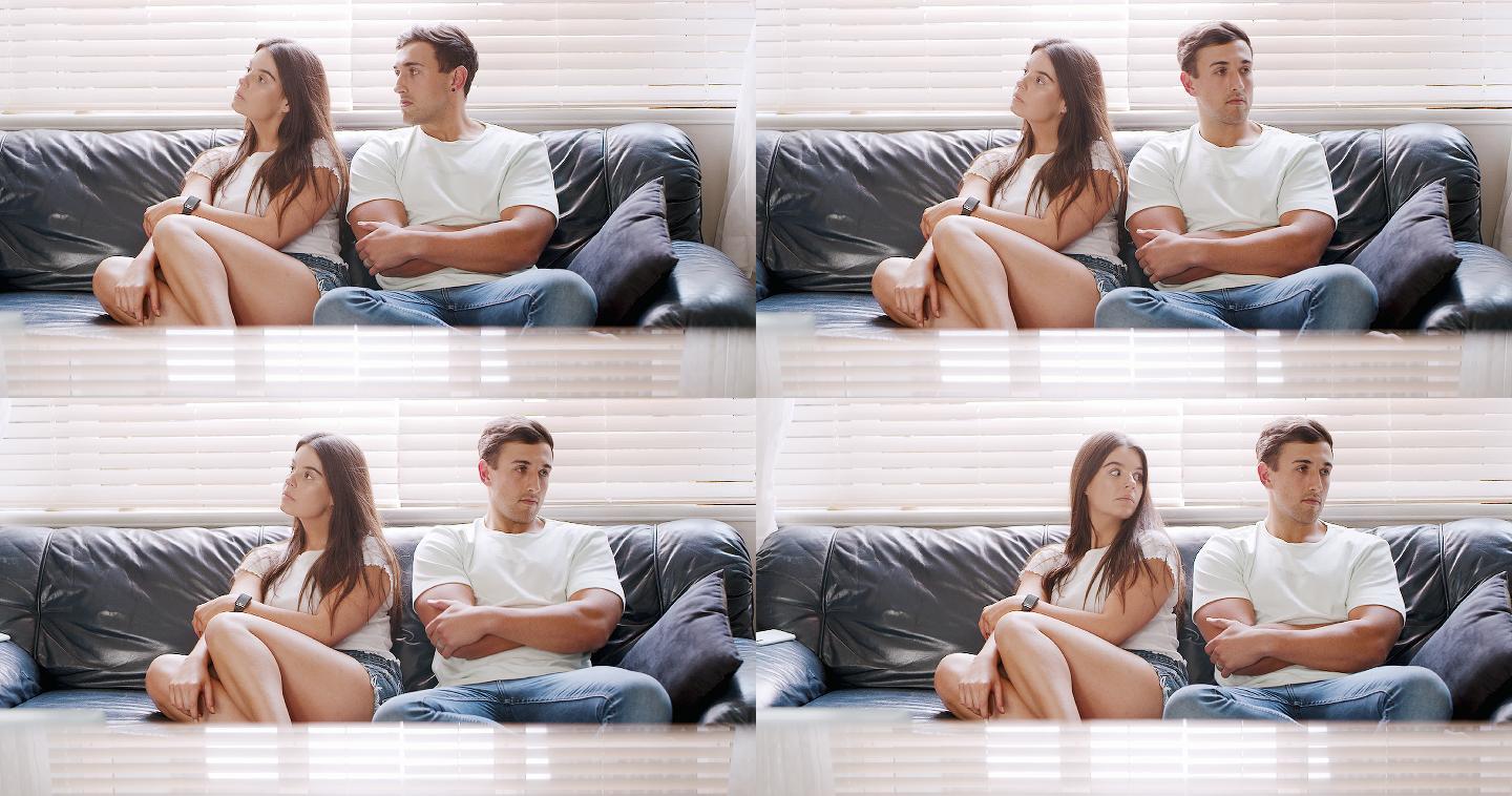 一对年轻夫妇在家里坐着不理对方的4k视频片段
