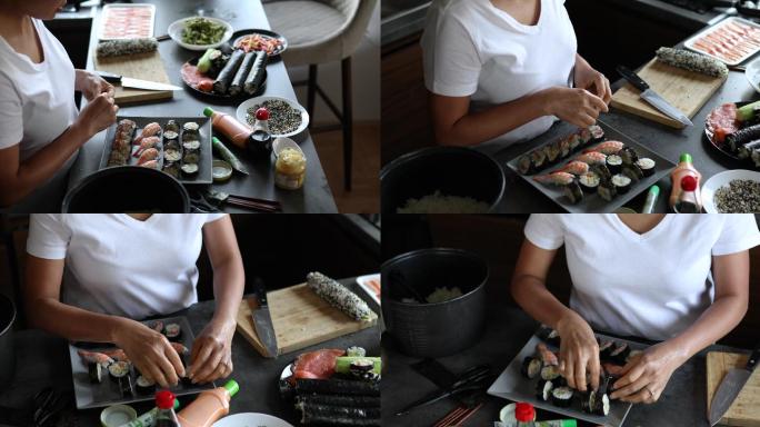 女士用Nigiri寿司卷、基本寿司卷和由内而外的寿司卷布置和装饰盘子