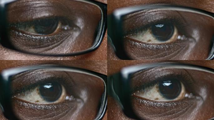 ECU非裔美国人的棕色眼睛透过眼镜看