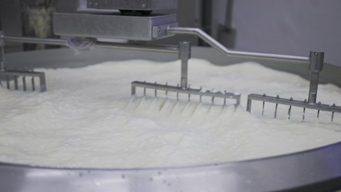 机械臂搅拌凝乳牛奶加工机器搅拌