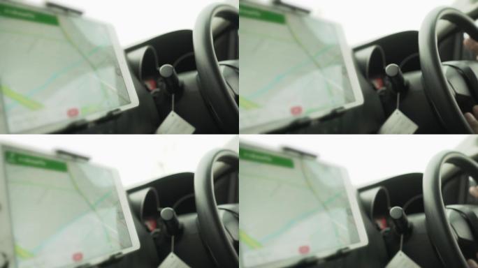 日间旅行中汽车导航器的4K模糊镜头
