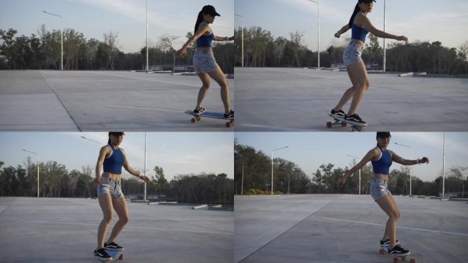 在美丽的夏日，亚洲女性在户外冲浪、滑冰或滑板。早上，快乐的年轻女性在公园玩冲浪溜冰。