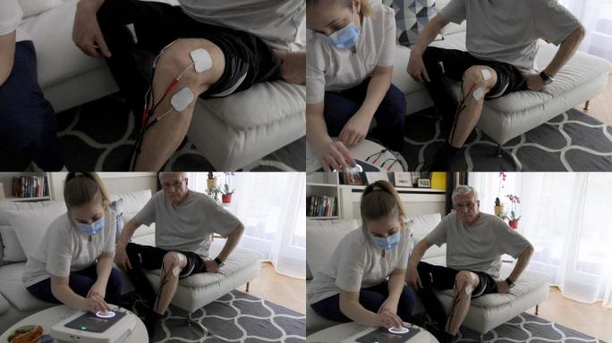 物理治疗师正在对一名老年男子的膝盖进行电刺激物理治疗