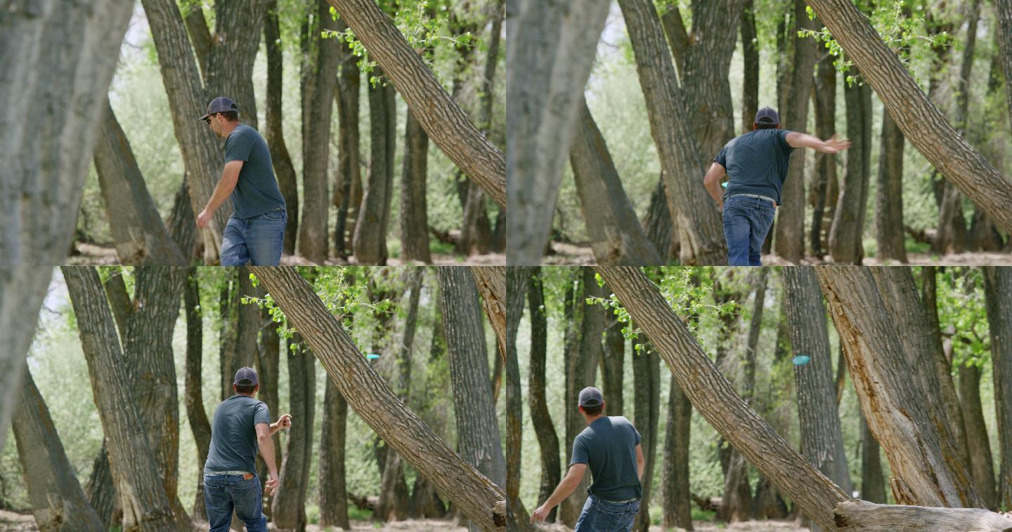 阳光明媚的日子里，一位40多岁的高加索人在一片荒芜的户外树木丛生的地方，用他的圆盘高尔夫圆盘击打一棵