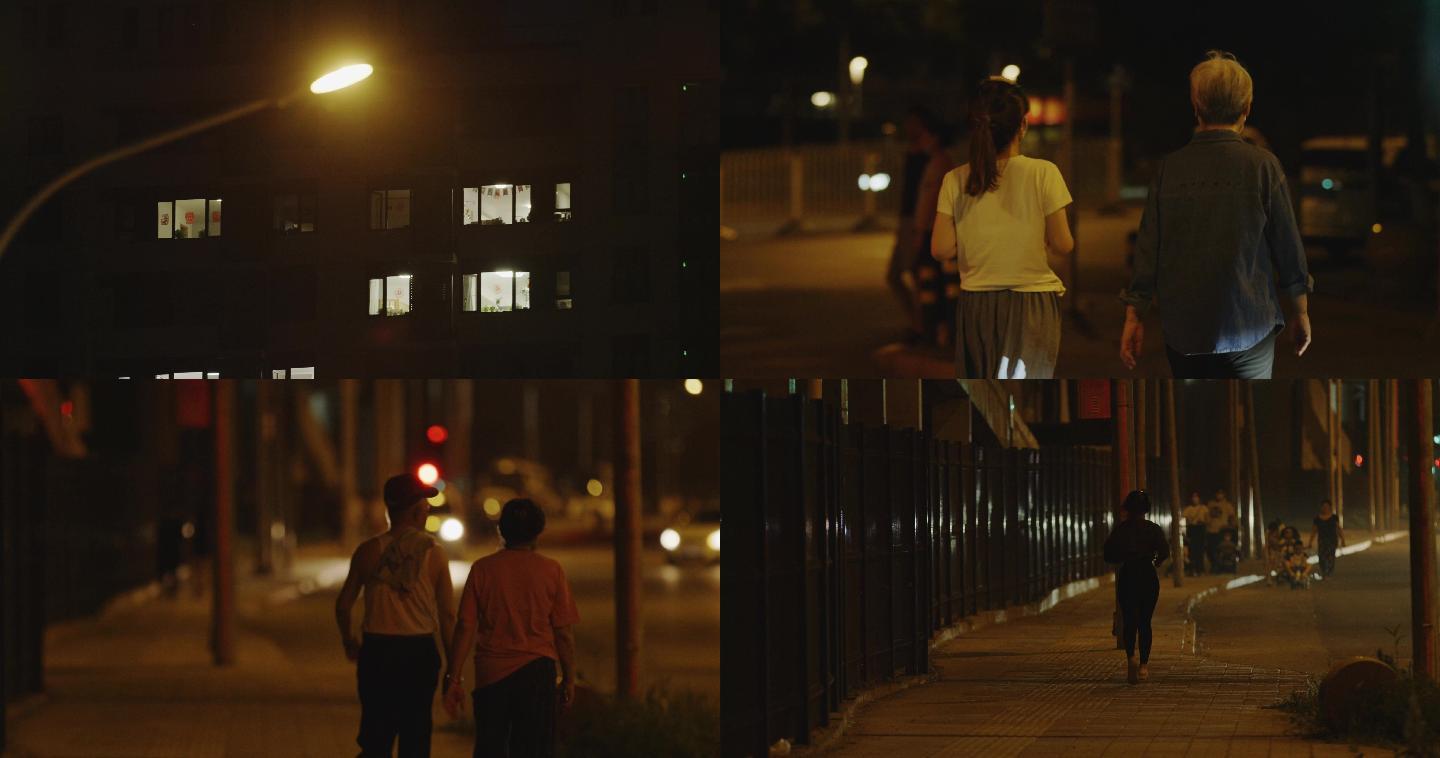 母女夜晚散步背影，北京夏日 街道行人