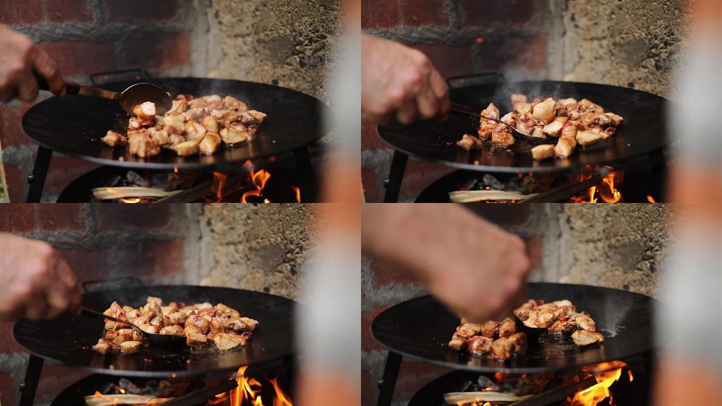 把肉放在烤架上。烤牛排的慢镜头。