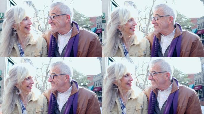 快乐的高加索老人喜欢在美丽的日子里在户外聊天