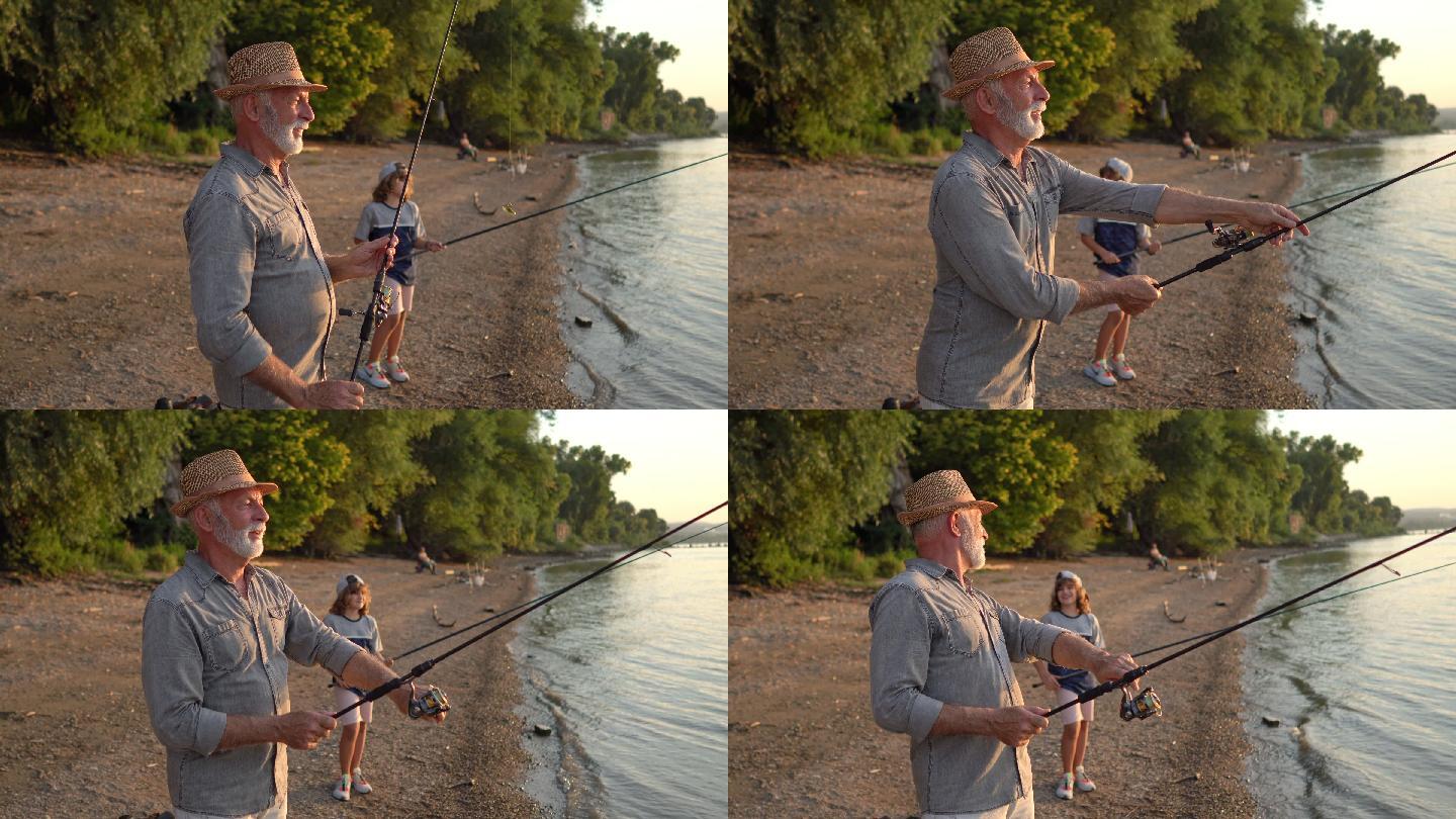 爷爷和孙子在河边钓鱼的时候在一起