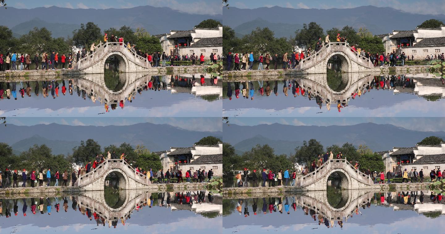 乡村桥上的游客江南园林古镇杭州风景江南水