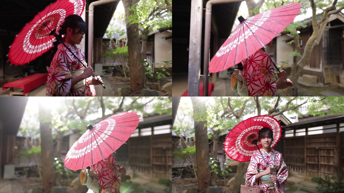 穿着和服的少女在日本的小花园里散步