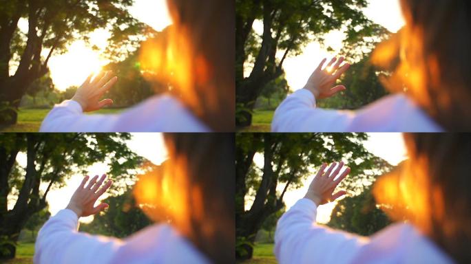 高清：女人把手放在眼睛上挡住阳光。