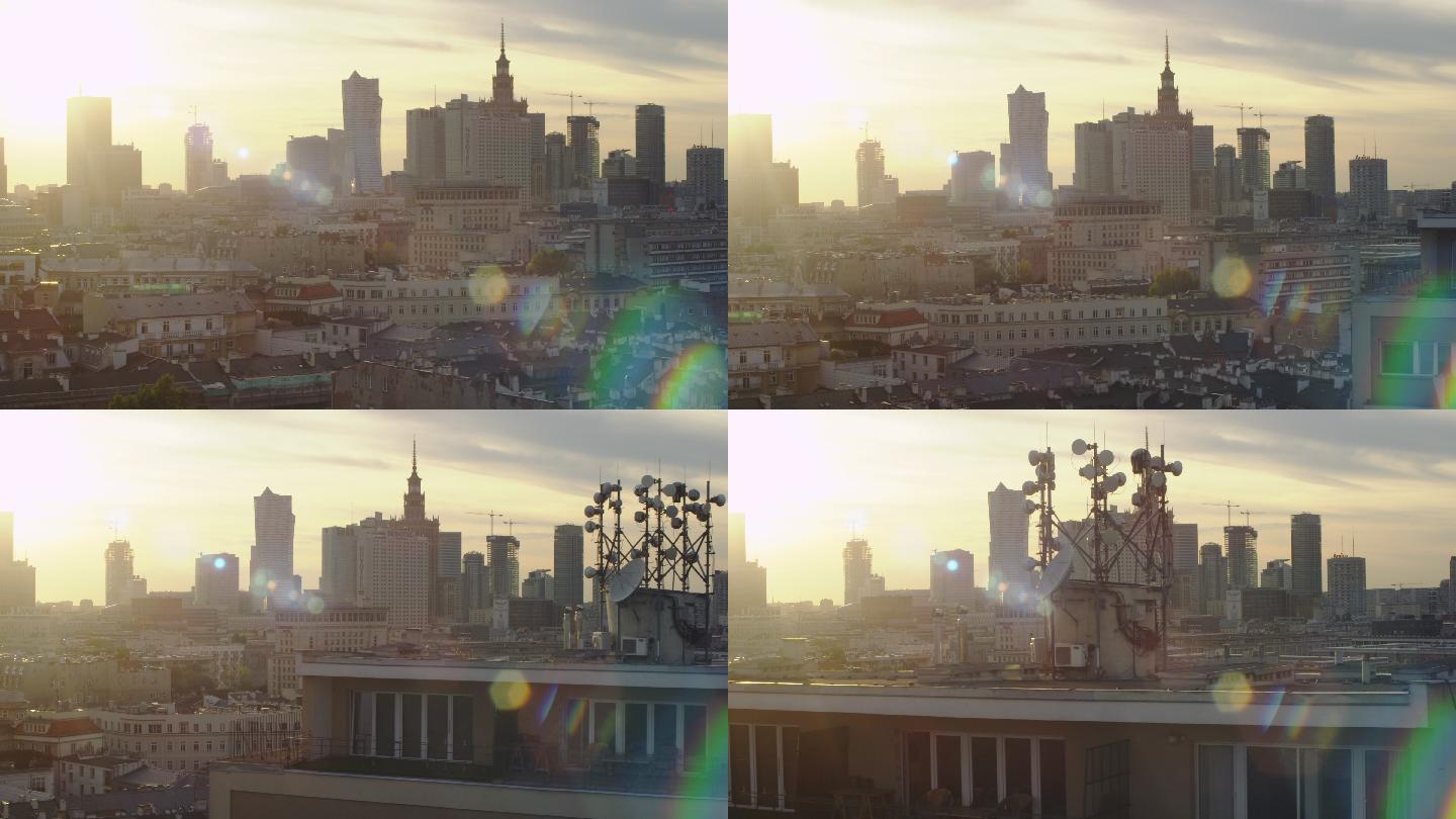 日落时分华沙中心鸟瞰图。从上面看住宅建筑和摩天大楼，屋顶上有%G发射机