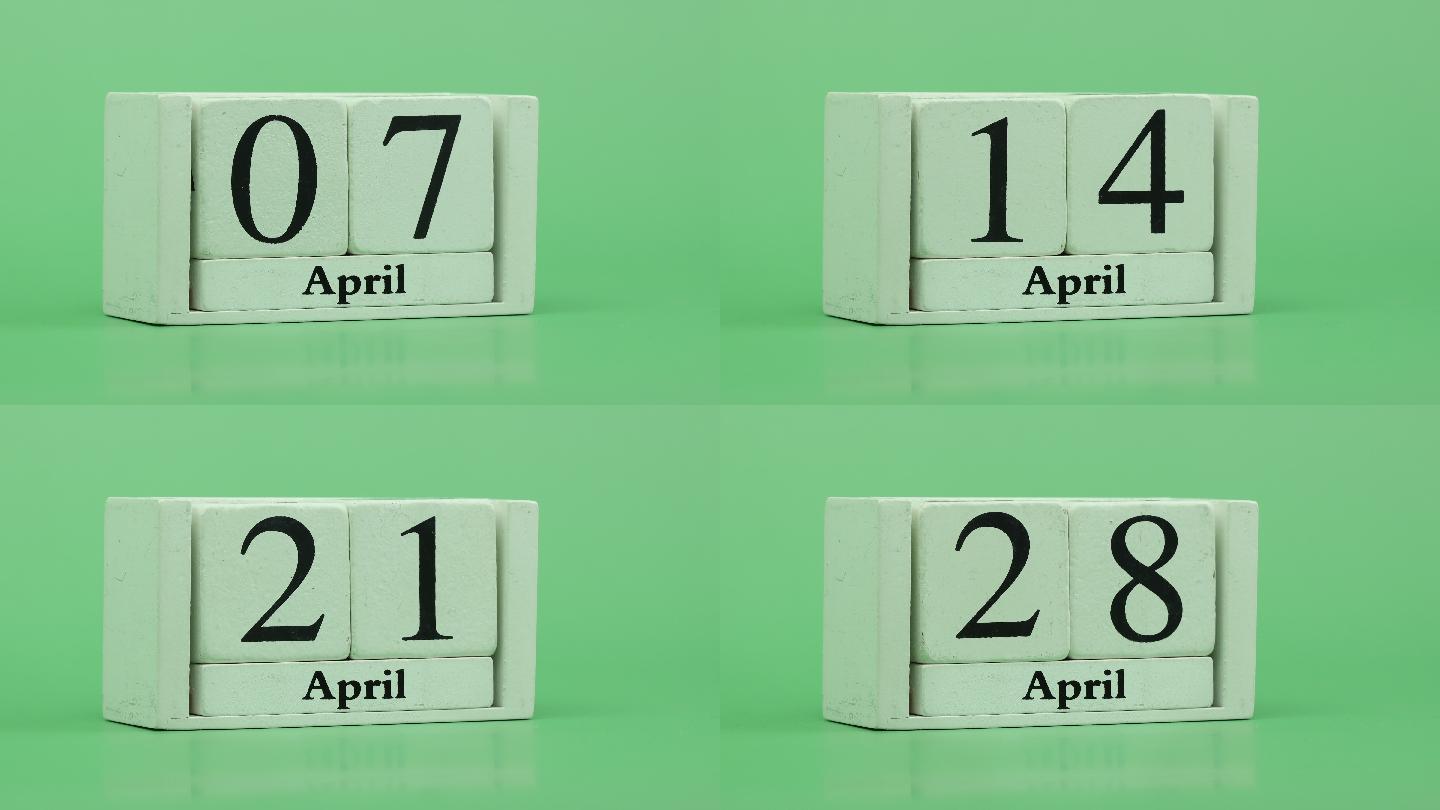 4月日历4K停止运动-通过在木桌上放置日期、月份和日期的手工木质日历，在一个月内实现快速的时间节奏