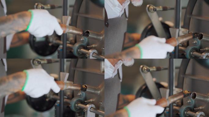 特写亚洲华人高级工匠手拿提尔从咖啡烤箱中提取咖啡豆烘焙生咖啡豆气味检查