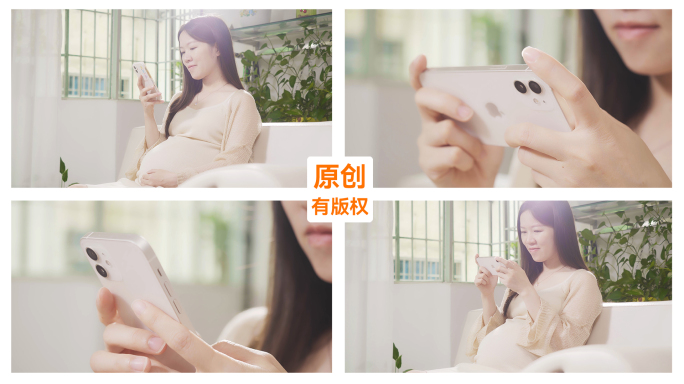 孕妇坐在沙发上玩手机