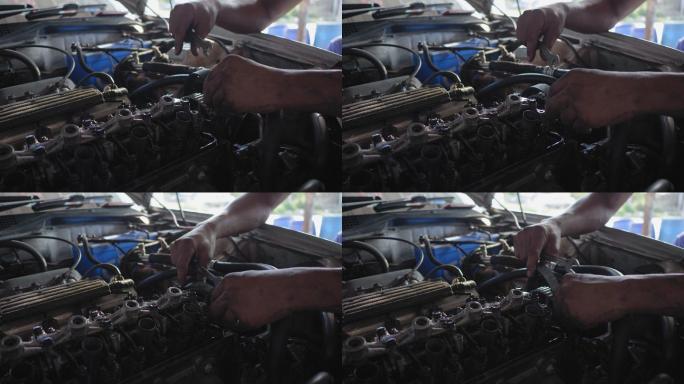 专业技工维修非常旧发动机的特写镜头
