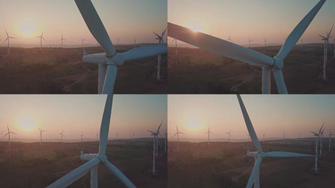 日落时鸟瞰风力涡轮机