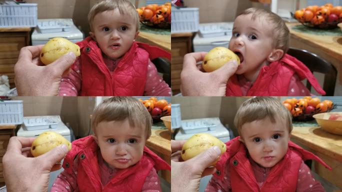 婴儿吃梨。含有维生素和矿物质的健康早餐。