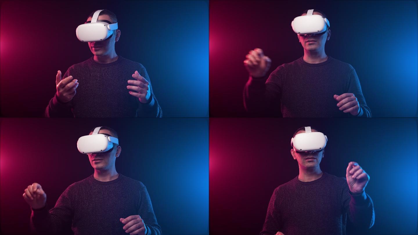 使用VR耳机在虚拟现实中度过时光的年轻成年男子