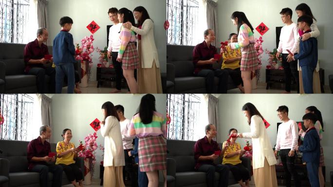 多代亚裔华人家庭在家庆祝中国新年