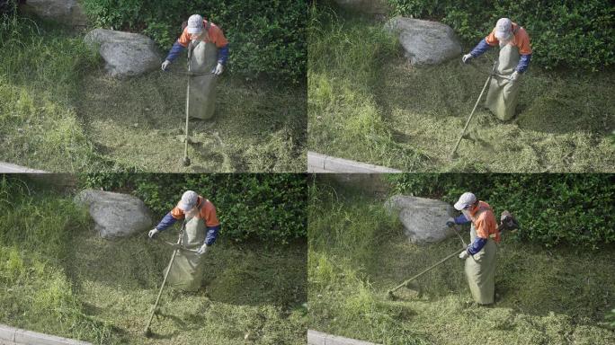 环卫工人使用除草机除草慢动作